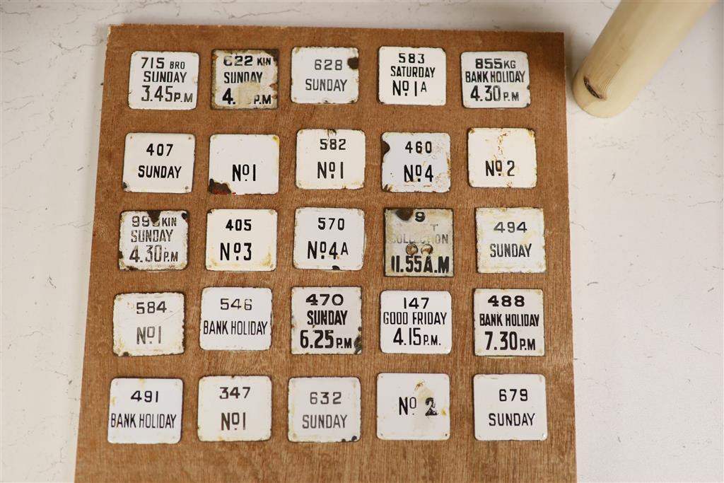 Postal History: A collection of 100 next post enamelled tabs, pre-war, mounted on four wooden display boards